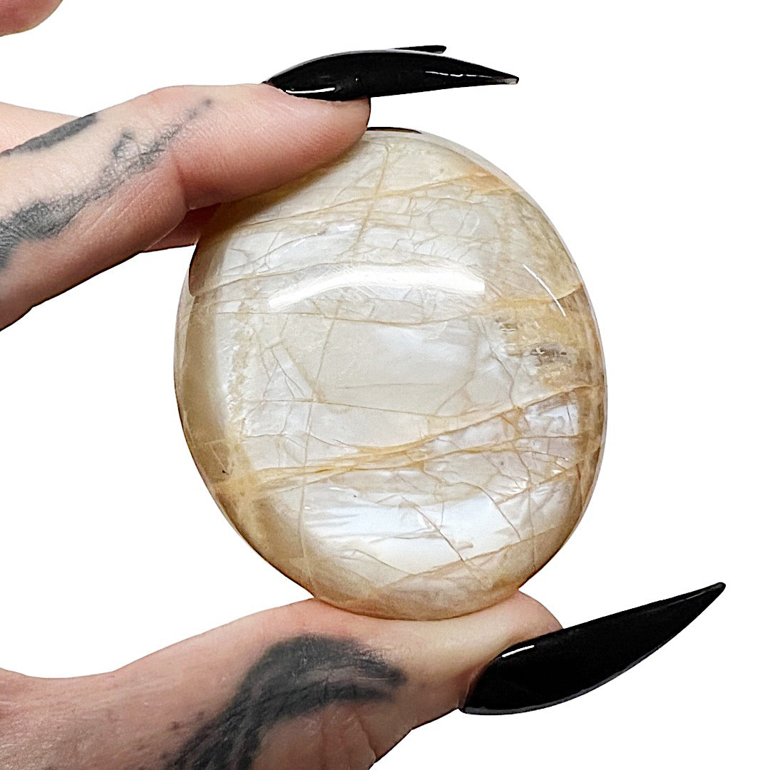 Joy Spark: Peach Moonstone Palm Stone