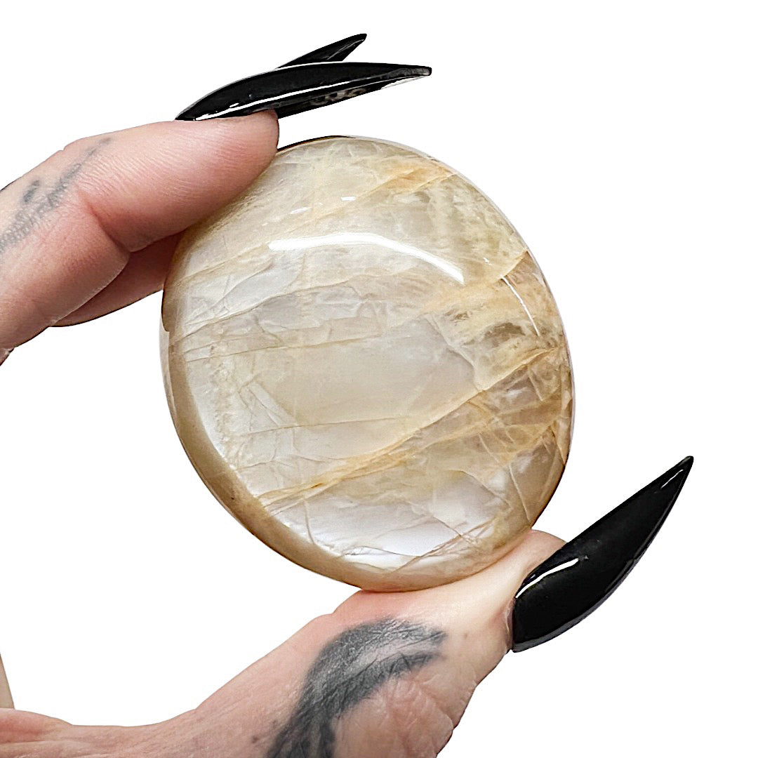 Joy Spark: Peach Moonstone Palm Stone