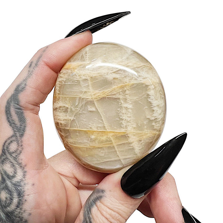 Joy Spark: Peach Moonstone Palm Stone